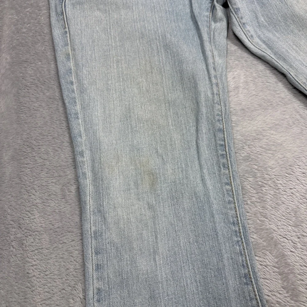 Vintage Levi's 518 Superlow Bootcut Jeans 31x31 Blue Light Wash Low Rise Stained